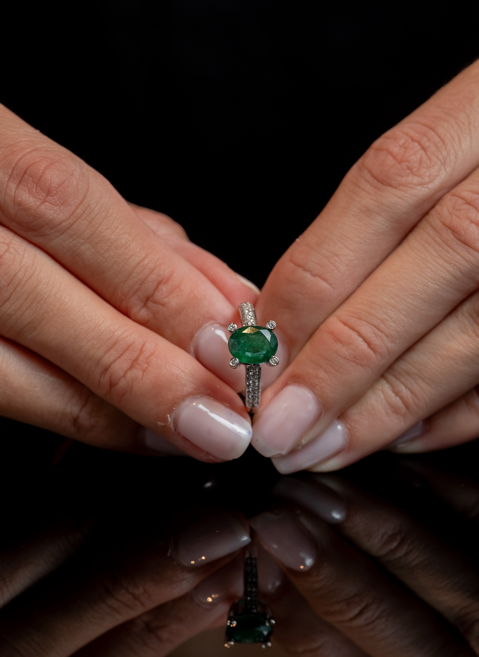 Oval Cut Emerald Ring and Diamonds