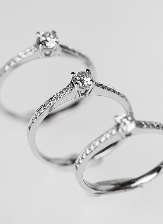 Solitaire Ring with Pavé Diamonds
