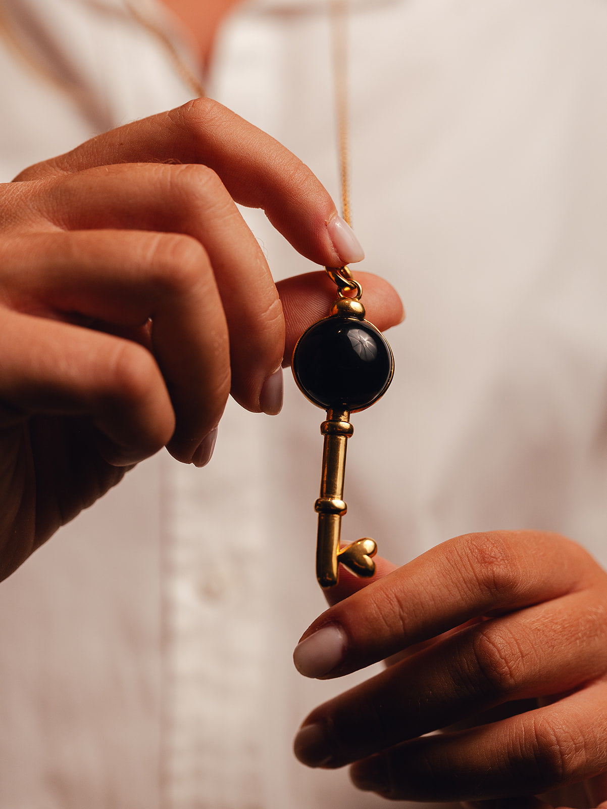 Dolce Far Niente Black Antler, Onyx and Golden Silver Necklace